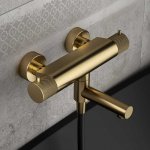 Hotbath Cobber X Bateria wannowo-natryskowa termostatyczna ścienna z ruchomą wylewką Brushed brass PVD CX020.BBP